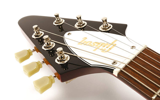 The classic arrowhead headstock remains